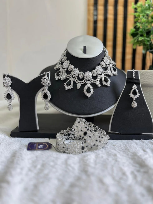 Silver plated Zircon Floral Moti sets 
With bangles