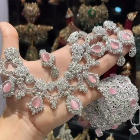 Silver plated Zircon Floral Moti sets 
With bangles