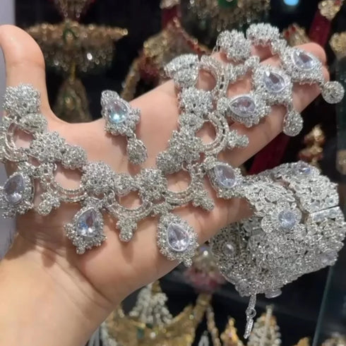 Silver plated Zircon Floral Moti sets 
With bangles