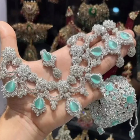 Silver plated Zircon Floral Moti sets 
With bangles