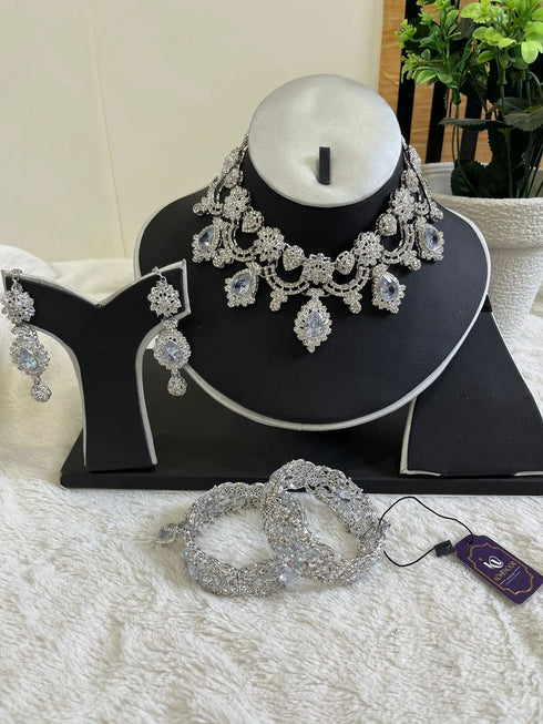 Silver plated Zircon Floral Moti sets 
With bangles